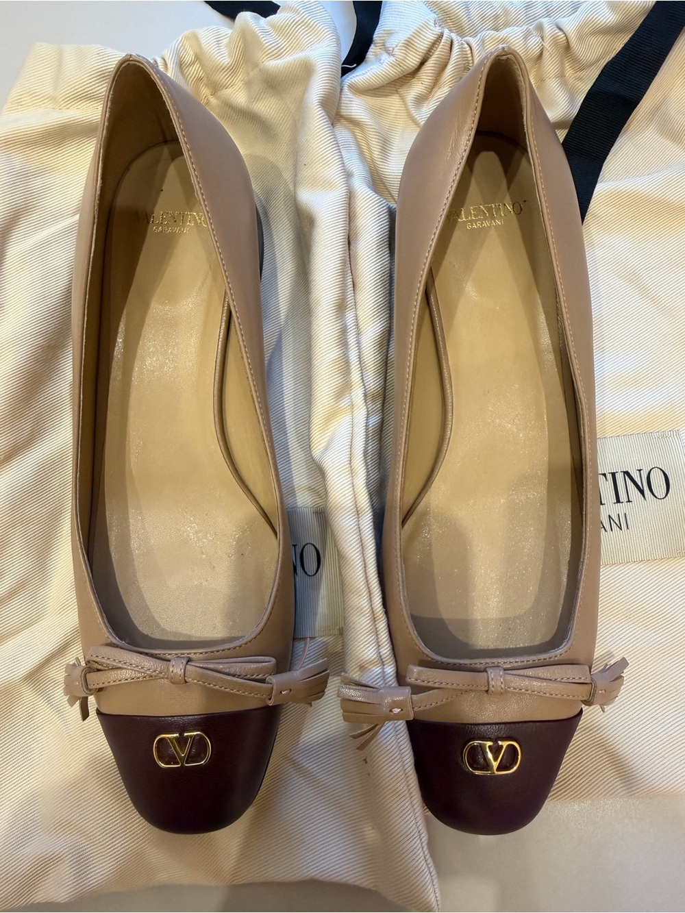 Valentino Garavani Two-Tone Bow Cap-Toe Ballet Flats in Nude and Burgundy